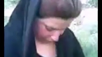 Arab Hijabi Indulges In Outdoor Pleasure