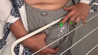 Stepson Witnesses Stepmother'S Arousal As She Rubs Her Large Penis On The Dryer